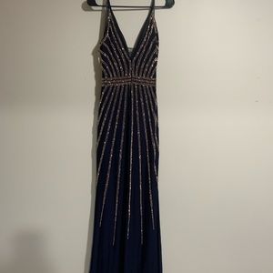 Navy evening grown with rose gold details